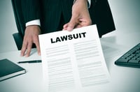 lawyer-shoving-document